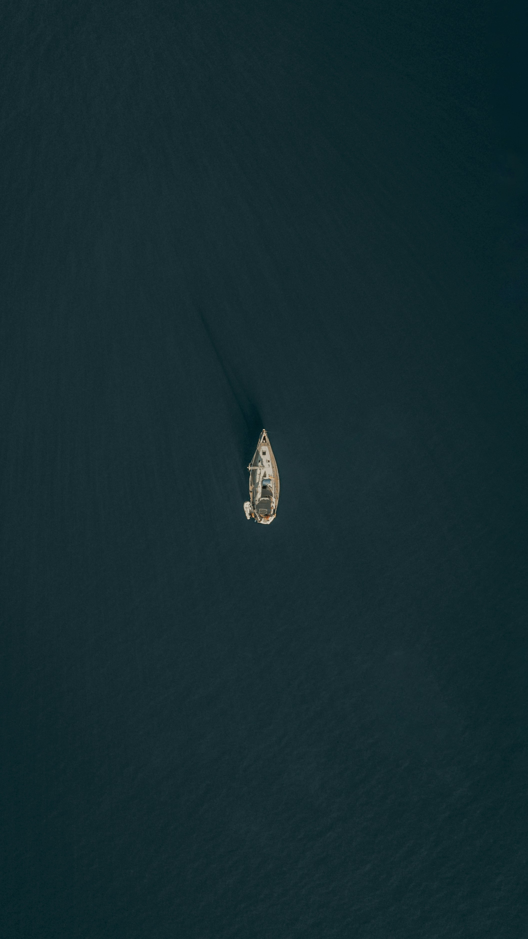 aerial view of boat on sea during daytime